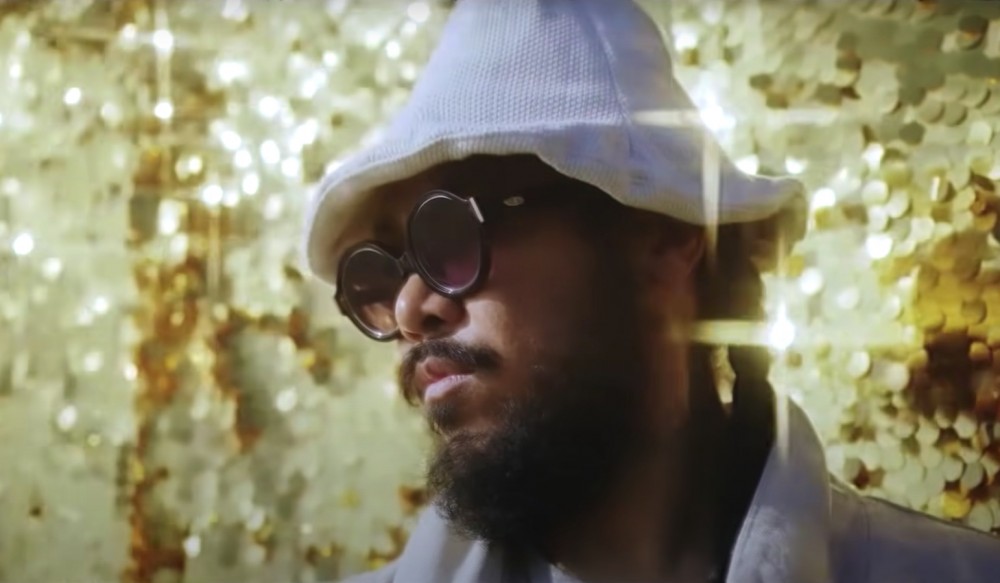 Mndsgn in the video for his single "Slowdance"